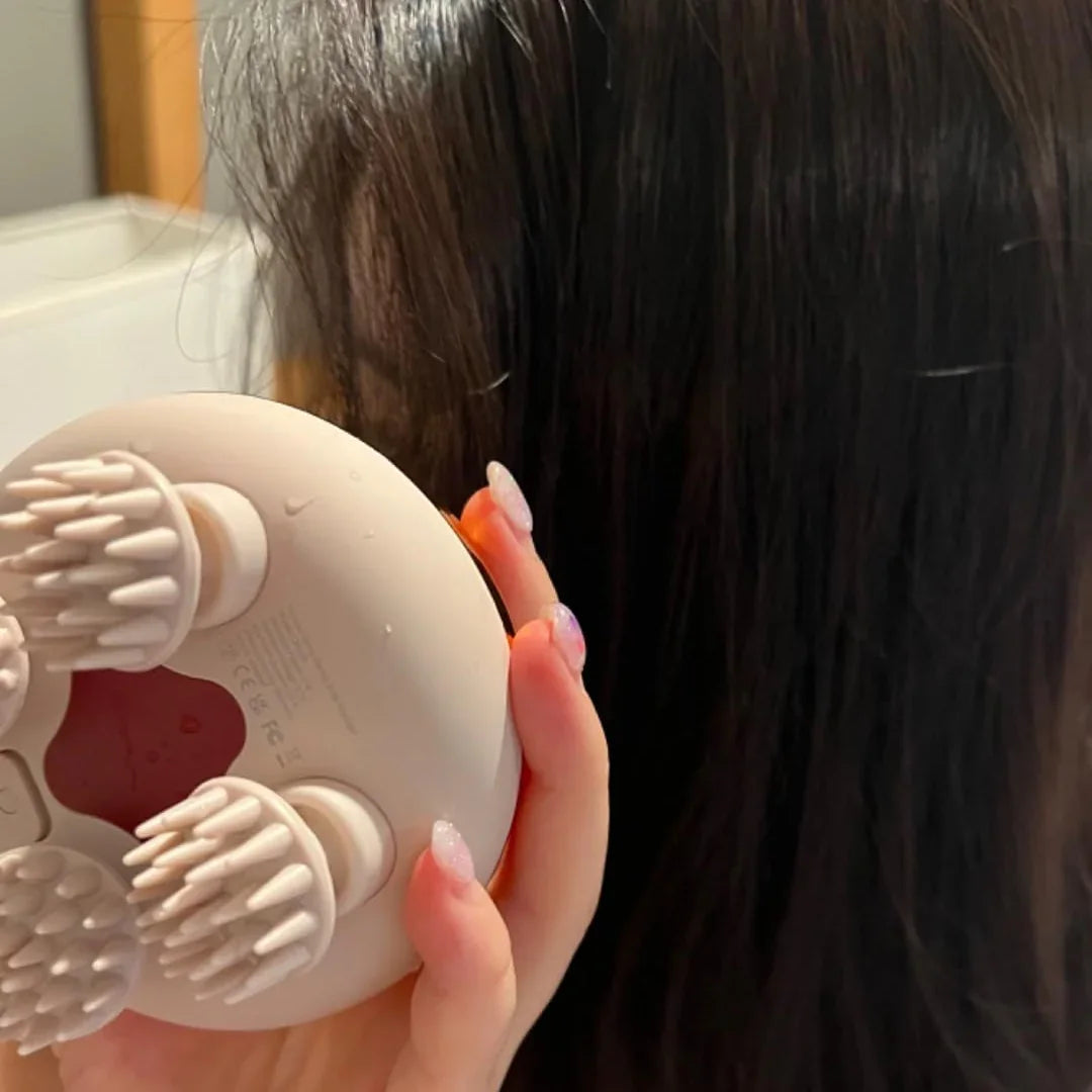 Person holding a white silicone tool with cut-out designs near their hair